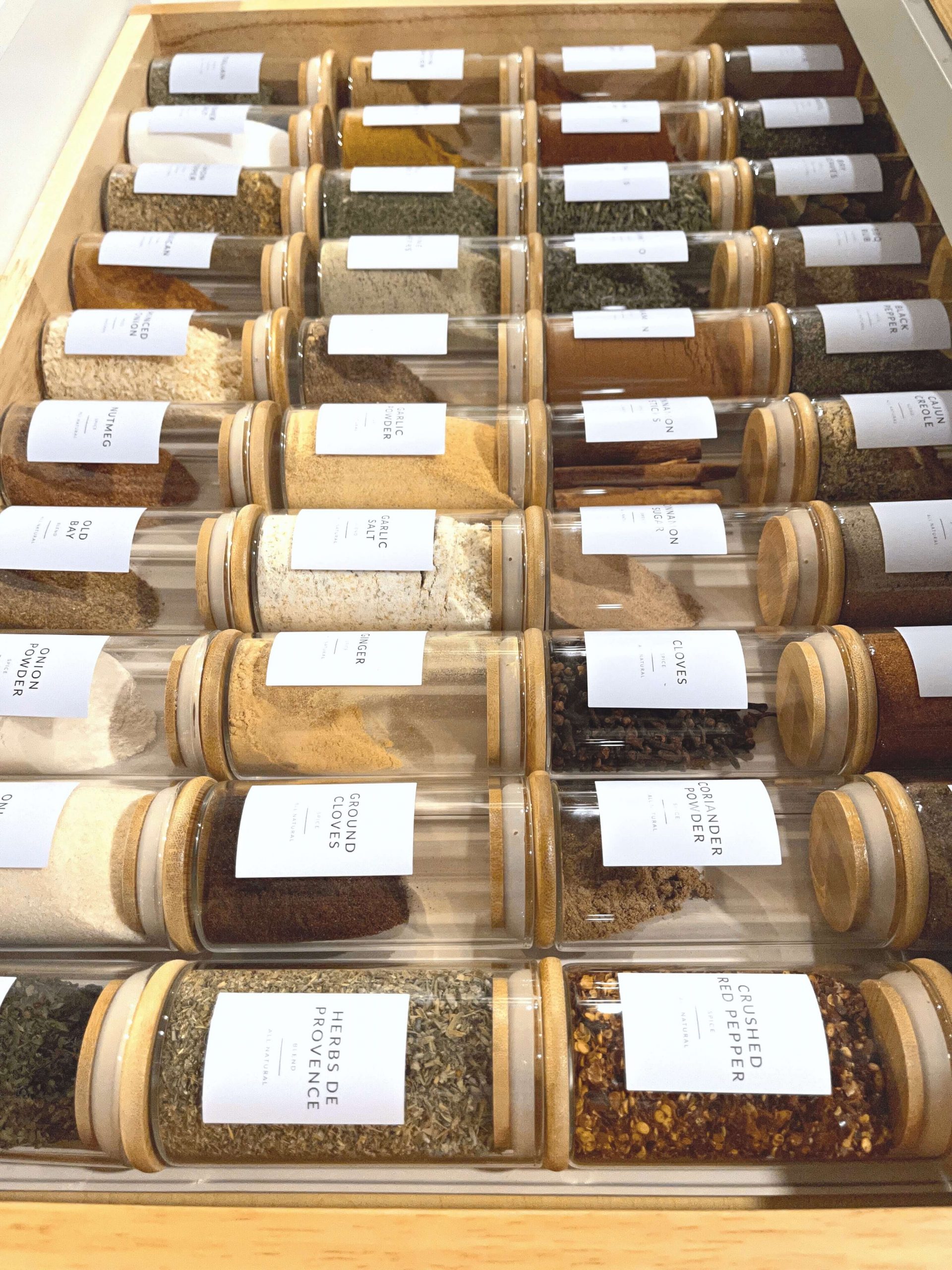 Melinda Grace Organizing Spice rack with glass jars, bamboo lids & white vinyl labels