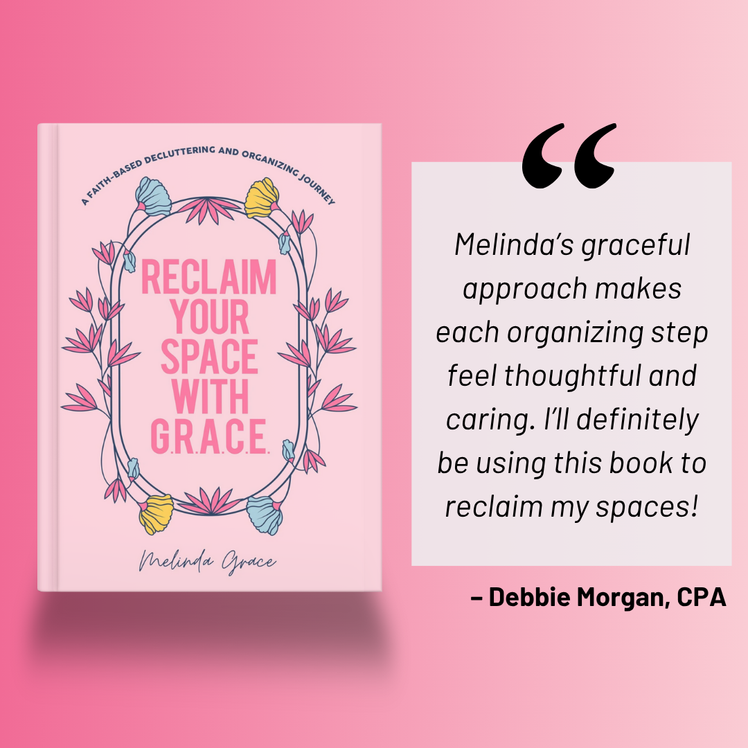 Pink background with organizing book and quote