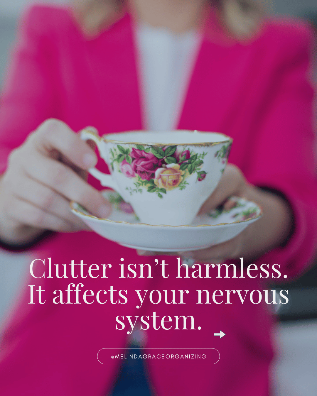 A woman holding a tea cup