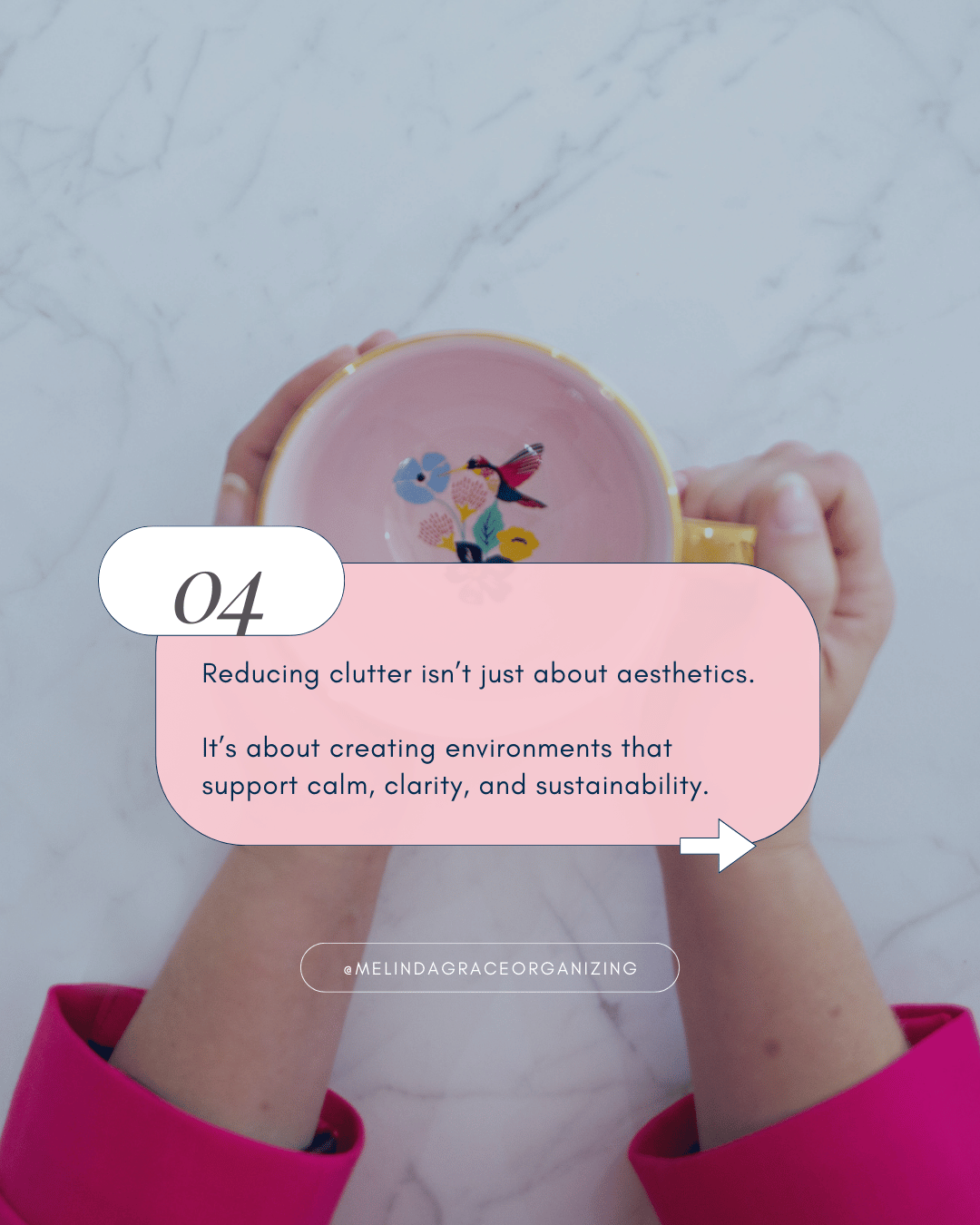 woman holding a pink coffee mug